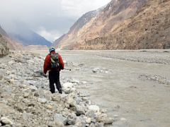 15 Shobo Walking On The Rocks Beside The Shaksgam River Between Kerqin And River Junction Camps On Trek To K2 North Face In China.jpg